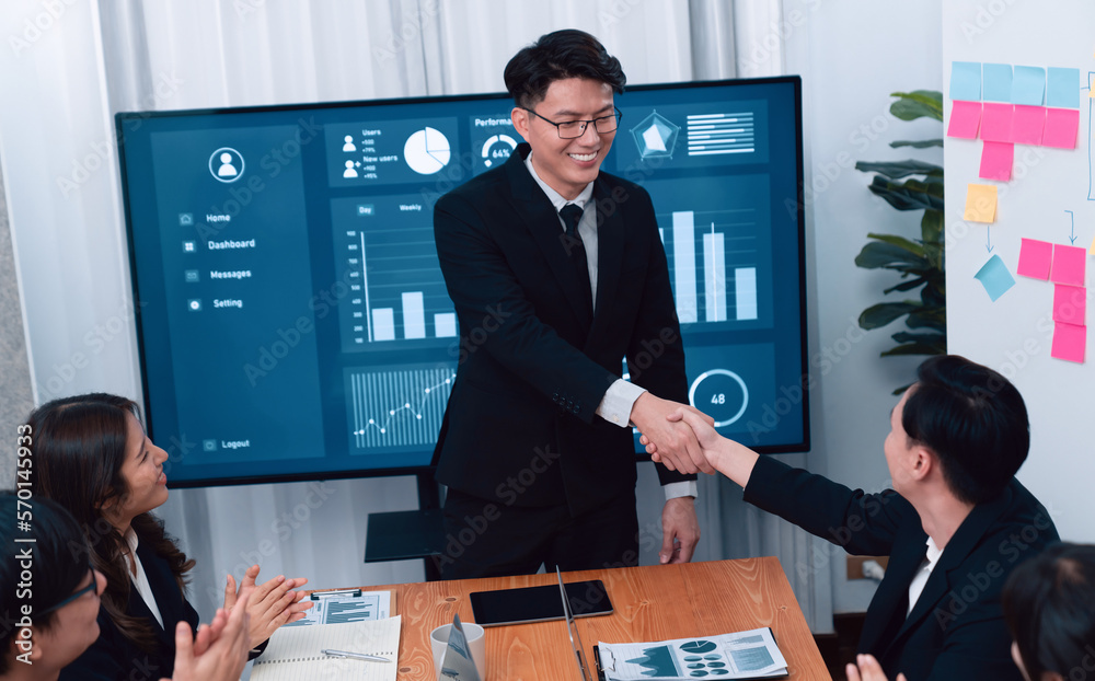 Businesspeople shake hand after successful agreement or meeting. Office worker colleague handshake w