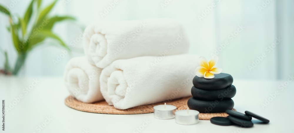 Spa accessory composition set in day spa hotel , beauty wellness center . Spa product are placed in 