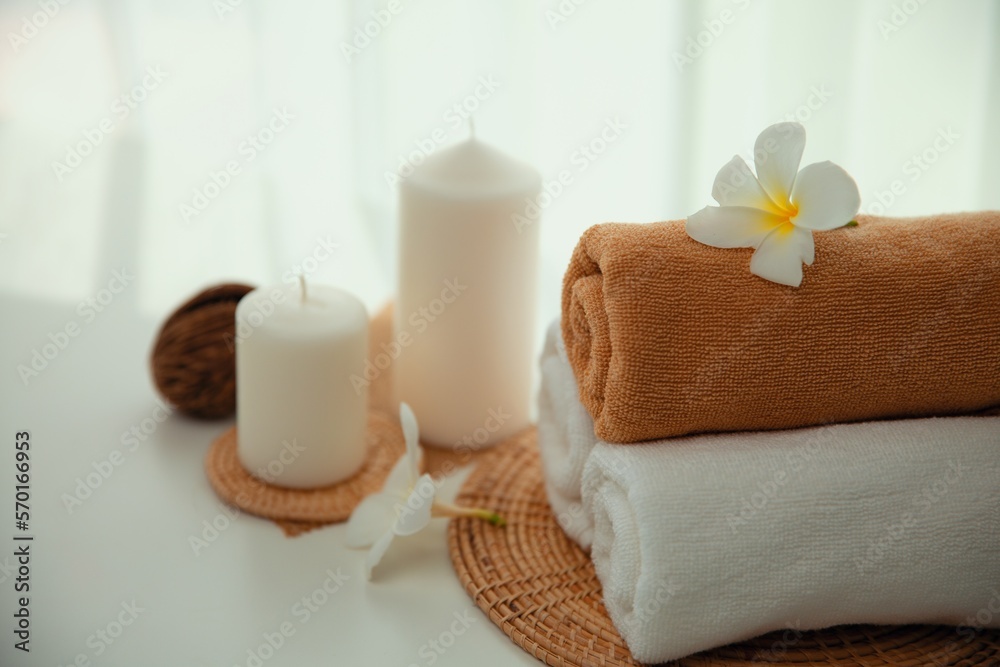 Spa accessory composition set in day spa hotel , beauty wellness center . Spa product are placed in 