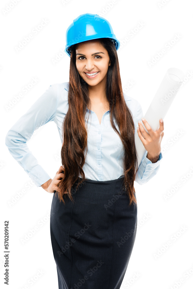 A young architect engineer designer employee smiling and posing with a safety helmet and blue prints