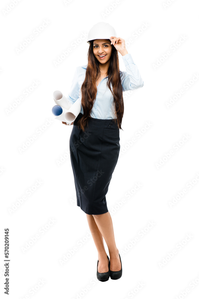 A young confident Indian female architect with a safety helmet and blue prints prepared to study ove