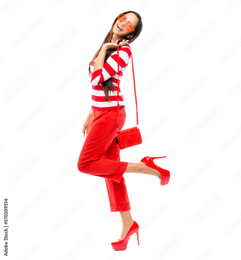 A cheerful fashionable young girl in shutter shades and red casuals ready to go for a party or a cel