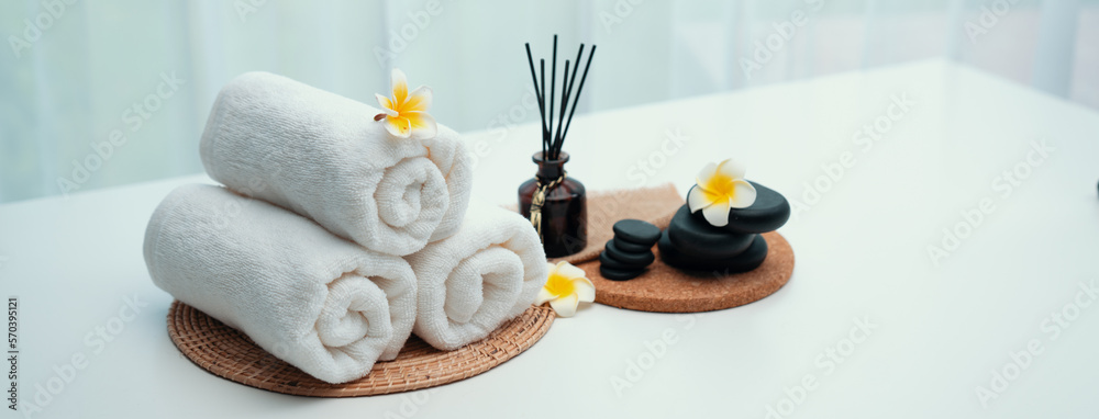 Spa accessory composition set in day spa hotel , beauty wellness center . Spa product are placed in 