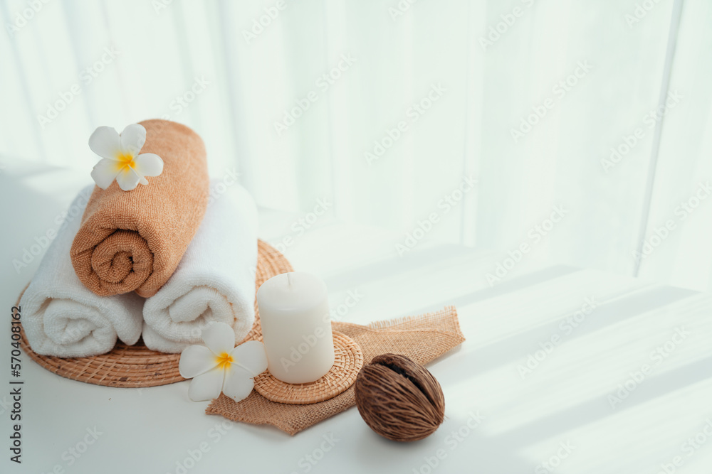 Spa accessory composition set in day spa hotel , beauty wellness center . Spa product are placed in 