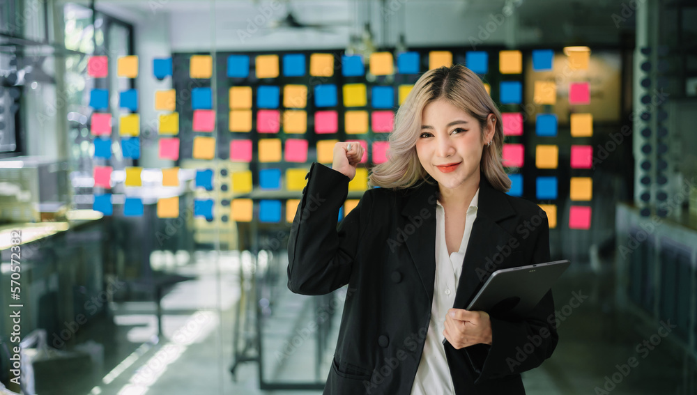 Modern business Asian woman in the office with copy space..