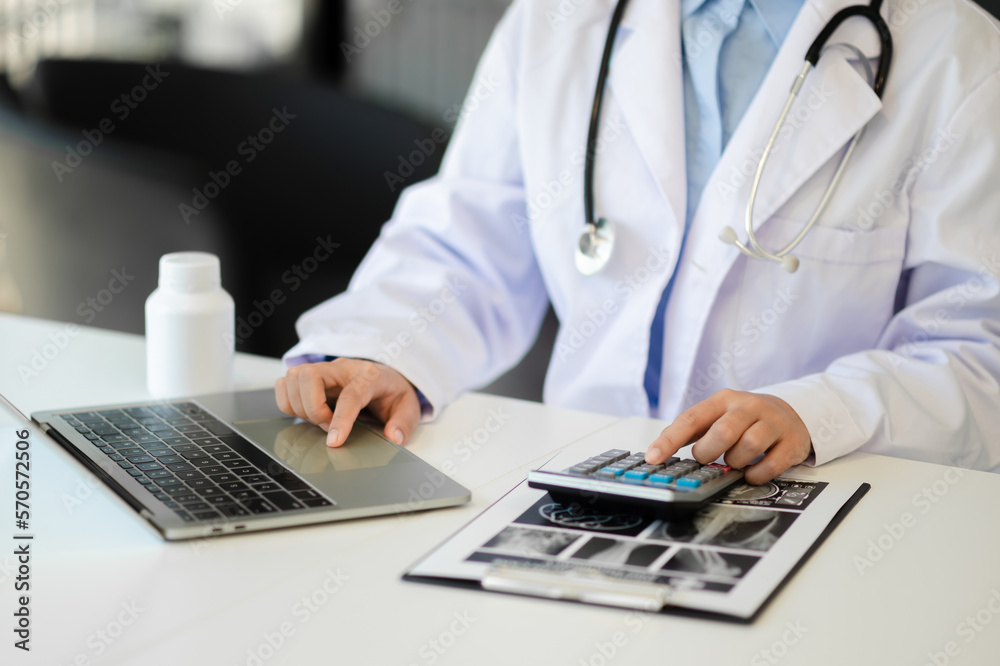 Medical technology concept. Doctor working with mobile phone and stethoscope and digital tablet lapt