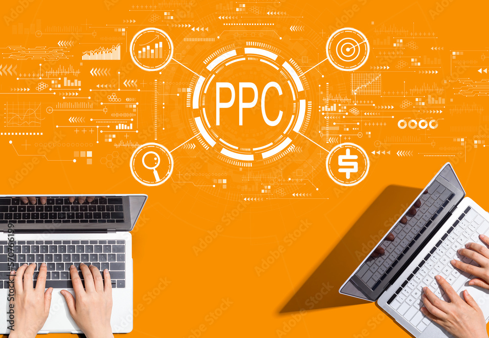 PPC - Pay per click concept with people working together with laptop computers