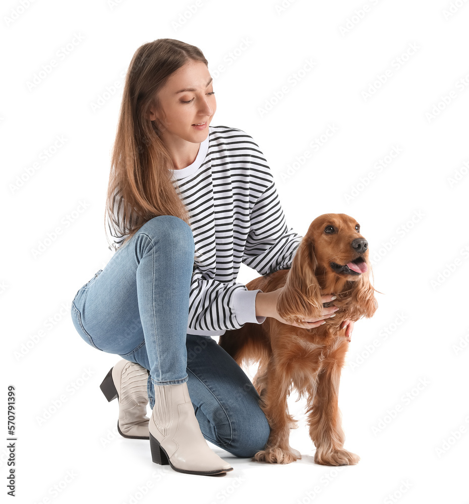 Young woman with red cocker spaniel on white background