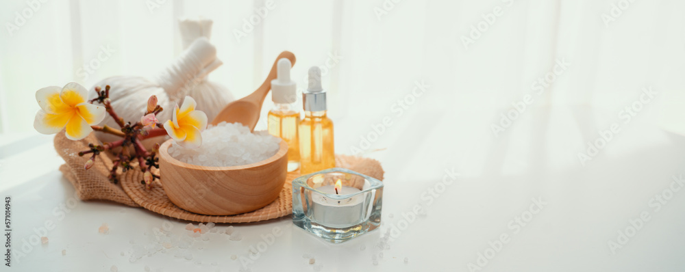 Spa accessory composition set in day spa hotel , beauty wellness center . Spa product are placed in 