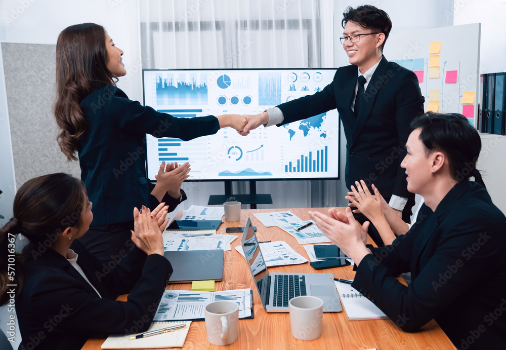 Businesspeople shake hand after successful agreement or meeting. Office worker colleague handshake w