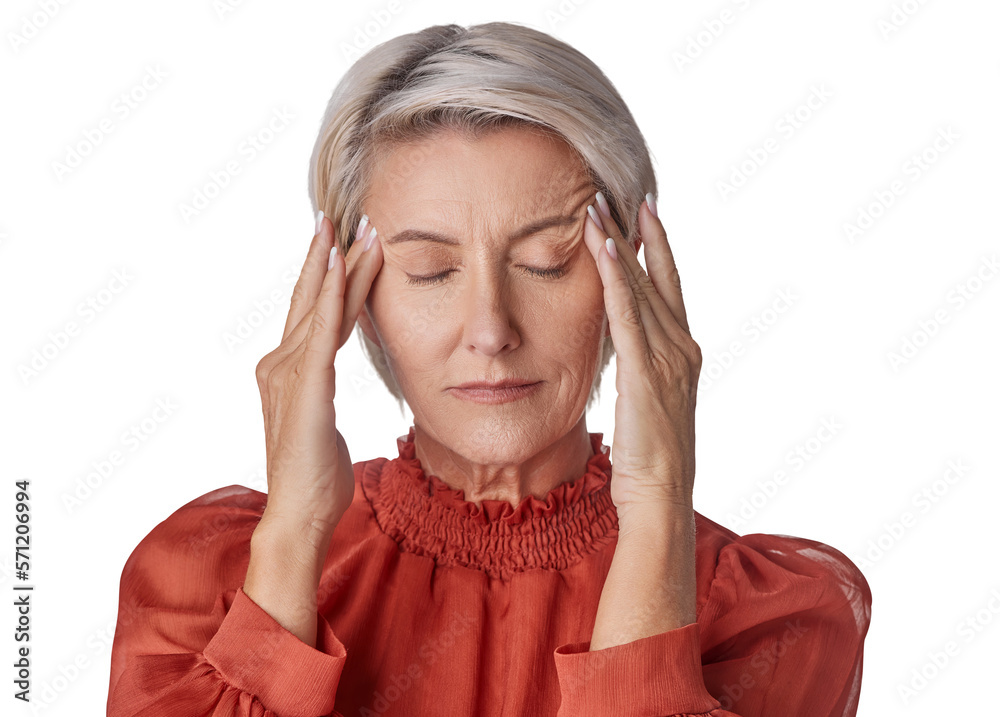 A mature woman suffering from stress or a headache grimacing in pain as she holds his head isolated 