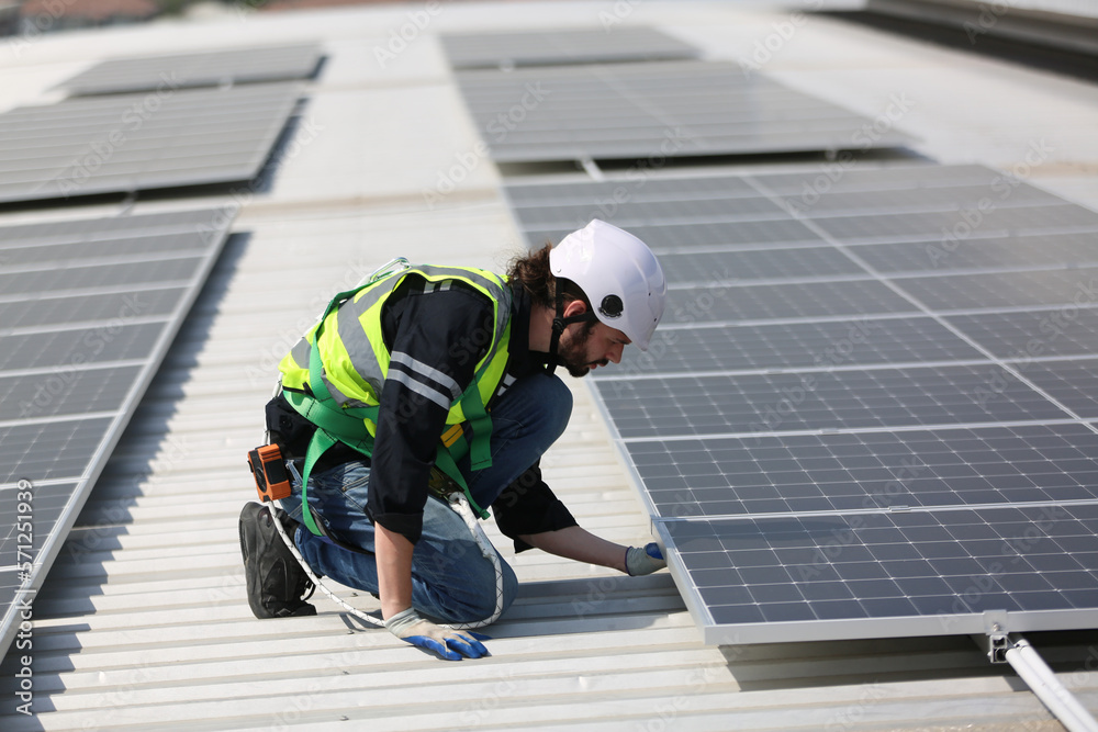 Technology solar cell, Engineer service check installation solar cell on the roof of factory. techni