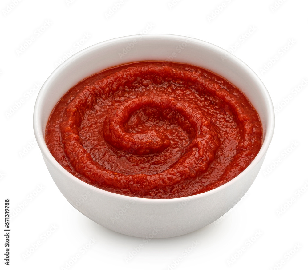 Ketchup in bowl isolated on white background, top view