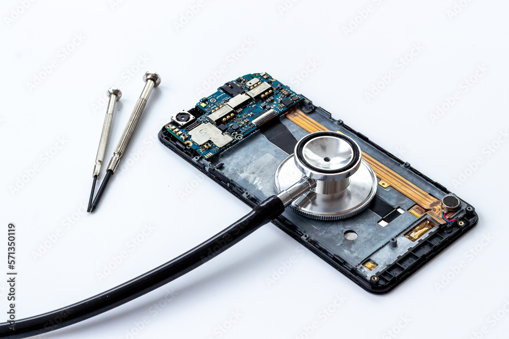 Repairing electronics circuit board - mobile phone with microchips