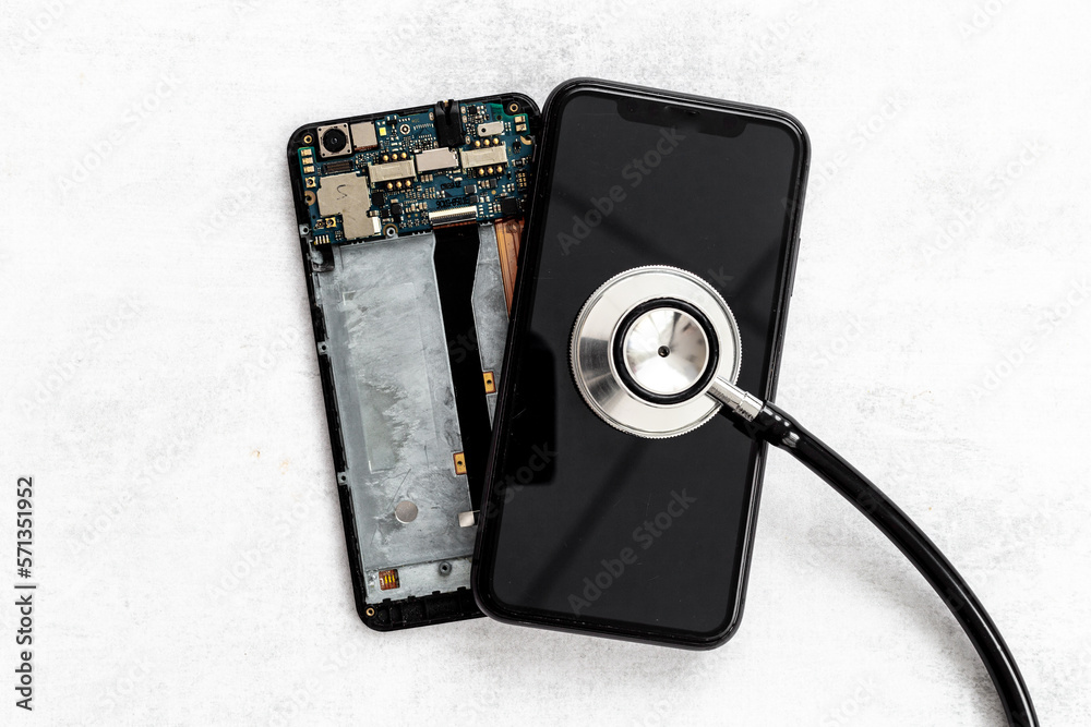 Mobile phone with stethoscope, electronics repair concept