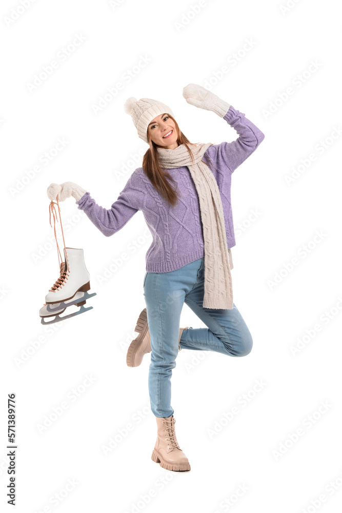 Pretty young woman with ice skates isolated on white background