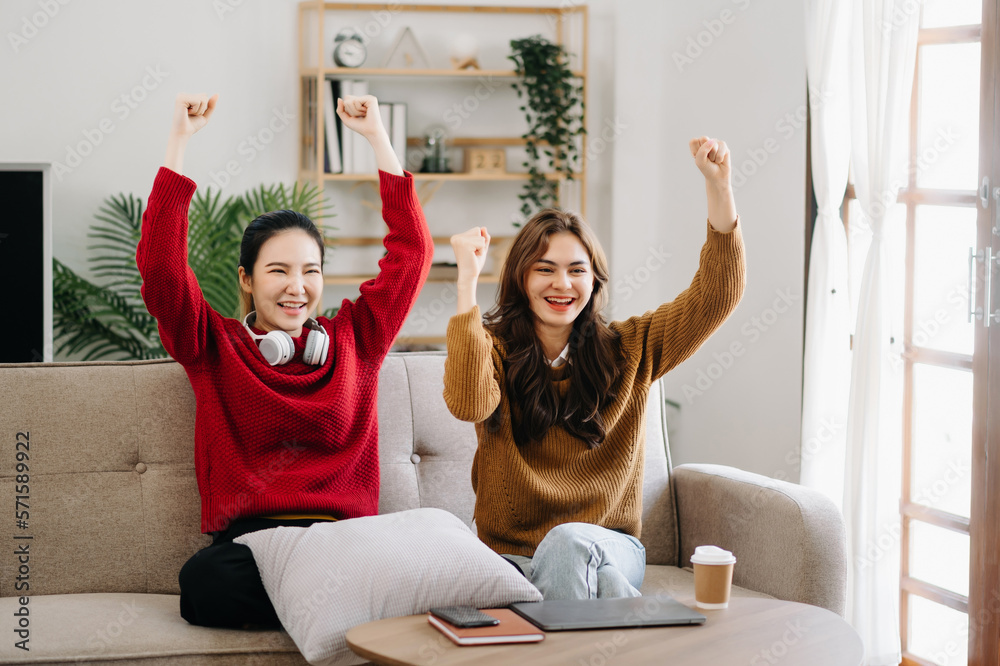 Two asian beauty smiling young women sitting on sofa Attractive casual girl feel happy and relax,hav