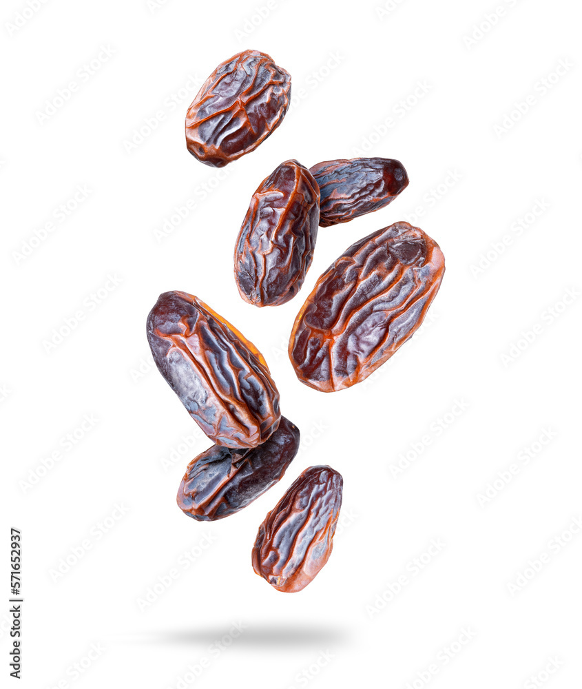 Big tasty dried dates in the air closeup isolated on a white background