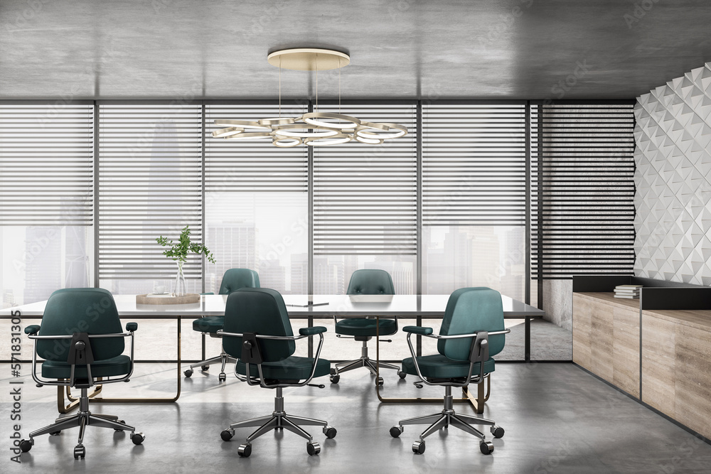 Sunlit spacious meeting room with green chairs around light glossy conference table on concrete floo