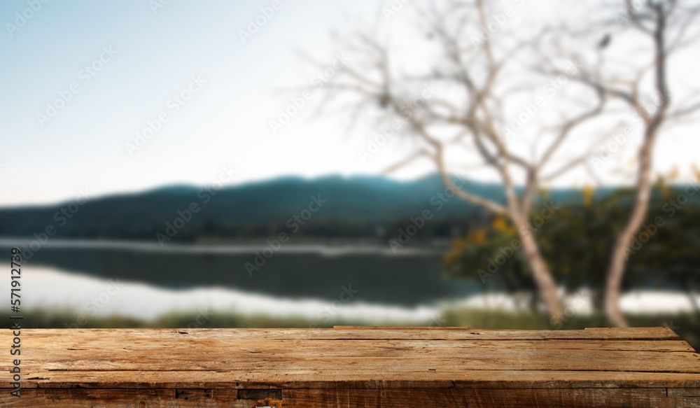 Empty top of wooden shelves on sky mountain and river trees front view background. For product displ