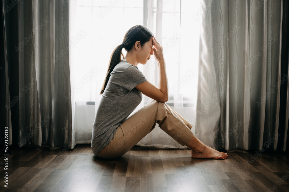 woman sit Depression Dark haired  pensive glance Standing by window and anxiety Copy space. ..