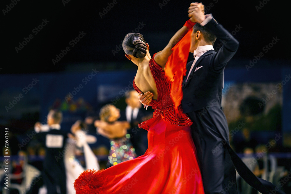 сouple dancers man and woman waltz dancing in competition