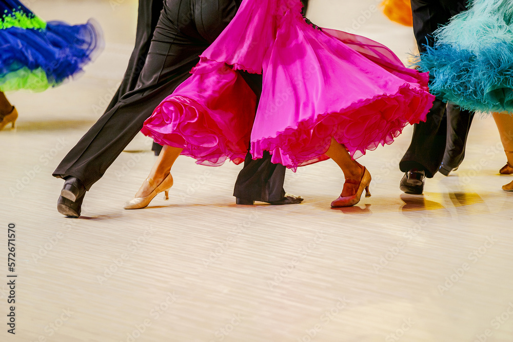 multicolored ball gowns for women dancers in sport dance competition