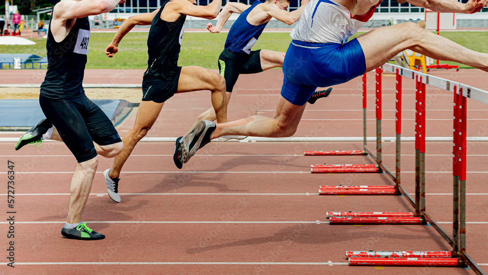 110 meter hurdles man runners running