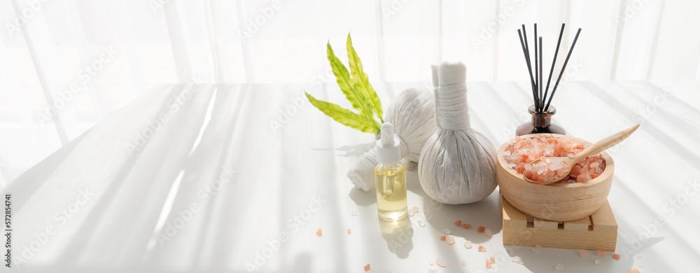 Spa accessory composition set in day spa hotel , beauty wellness center . Spa product are placed in 