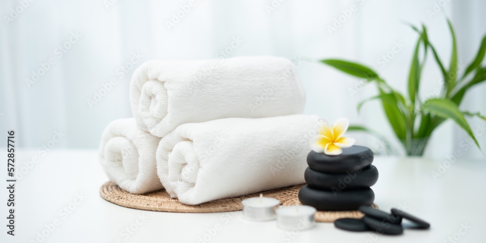 Spa accessory composition set in day spa hotel , beauty wellness center . Spa product are placed in 