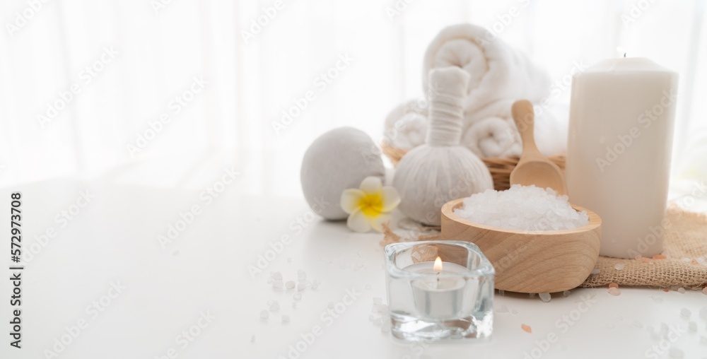 Spa accessory composition set in day spa hotel , beauty wellness center . Spa product are placed in 