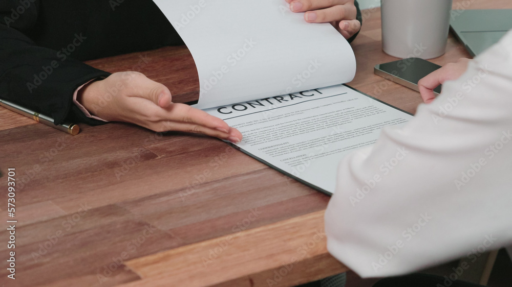 Closeup young enthusiastic businesswoman negotiate financial business contract in the office. Client