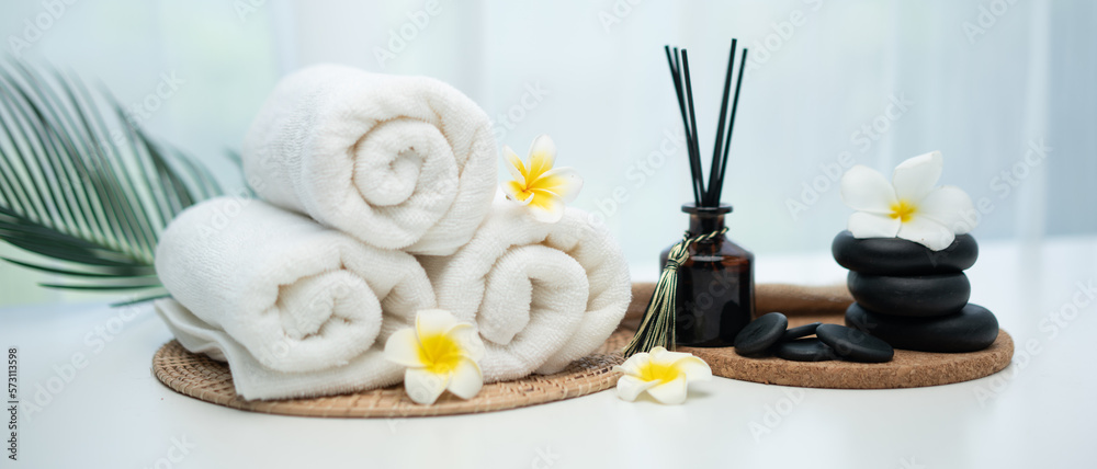 Spa accessory composition set in day spa hotel , beauty wellness center . Spa product are placed in 