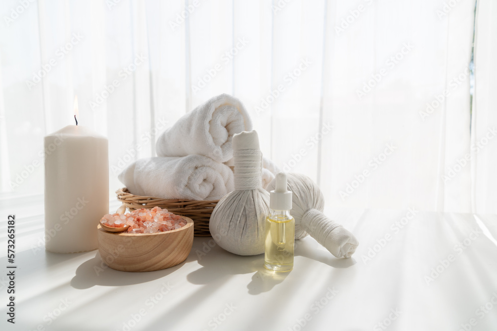 Spa accessory composition set in day spa hotel , beauty wellness center . Spa product are placed in 