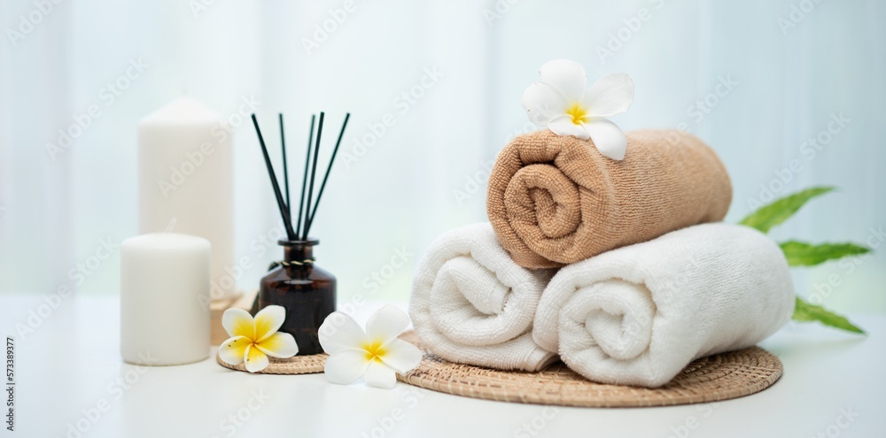 Spa accessory composition set in day spa hotel , beauty wellness center . Spa product are placed in 