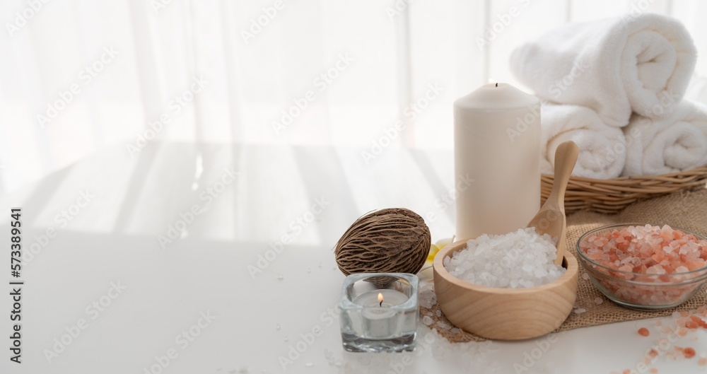 Spa accessory composition set in day spa hotel , beauty wellness center . Spa product are placed in 