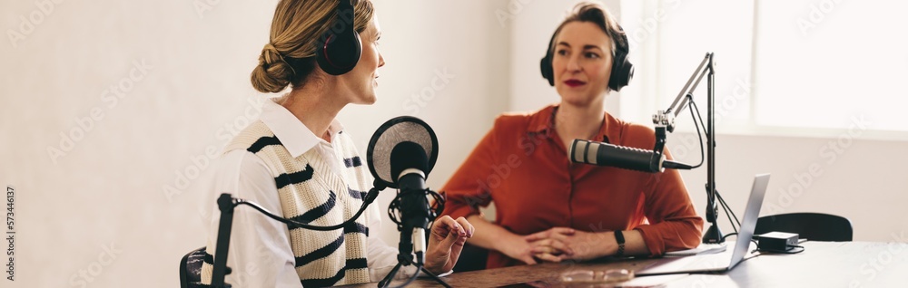 Female radio dj interviewing a guest on her show