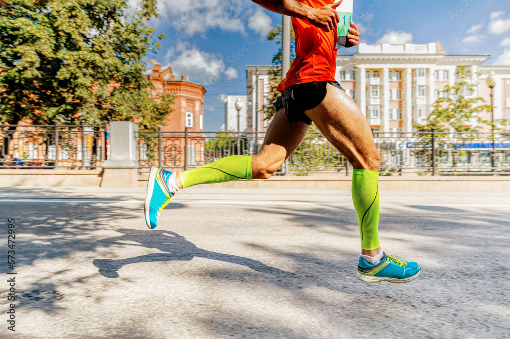 male runner athlete run summery city marathon race