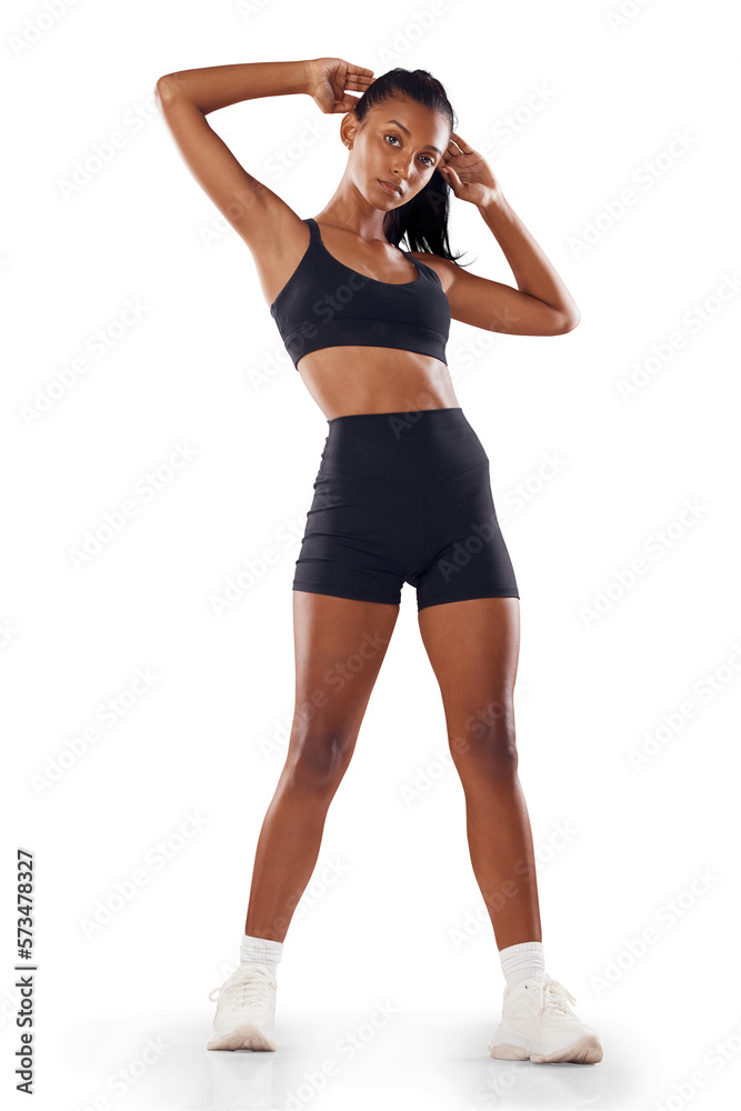 A beautiful active fitness woman in sportswear with her arms up while tying her hair. Athletic femal