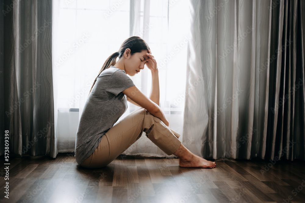 woman sit Depression Dark haired  pensive glance Standing by window and anxiety Copy space. ..