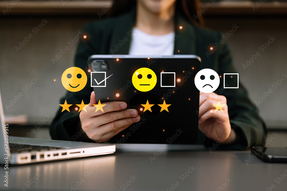 Customer service evaluation concept. Businesswoman pressing face smile emoticon show on virtual scre