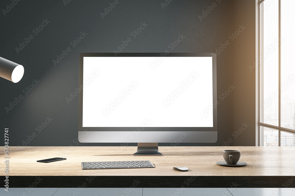 Front view on blank white modern computer monitor with place for your web site or web design on wood