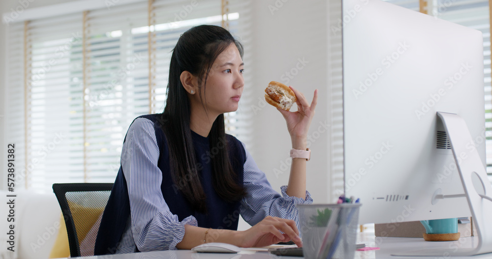 Asia people young woman MBA student gen Z girl work online on desk at home office multi tasking work