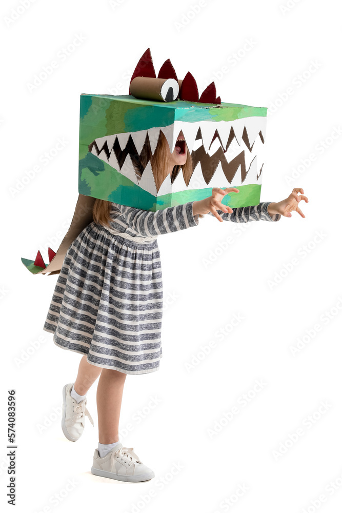 Little girl in cardboard dinosaur costume on white background