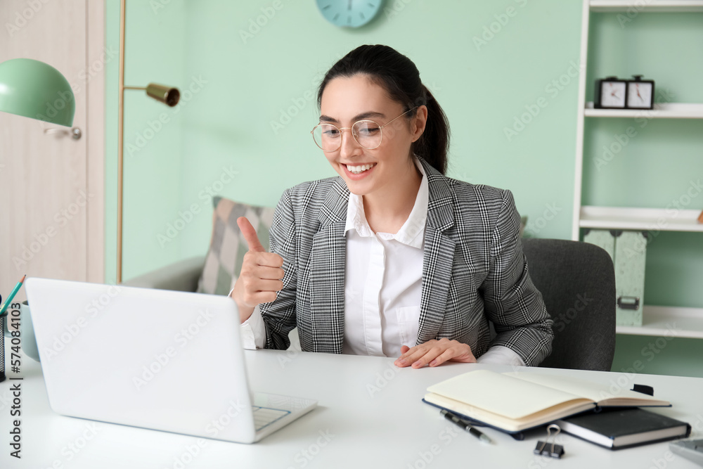 Female tutor giving online lesson at home