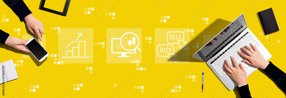 Stock trading theme with two people working together