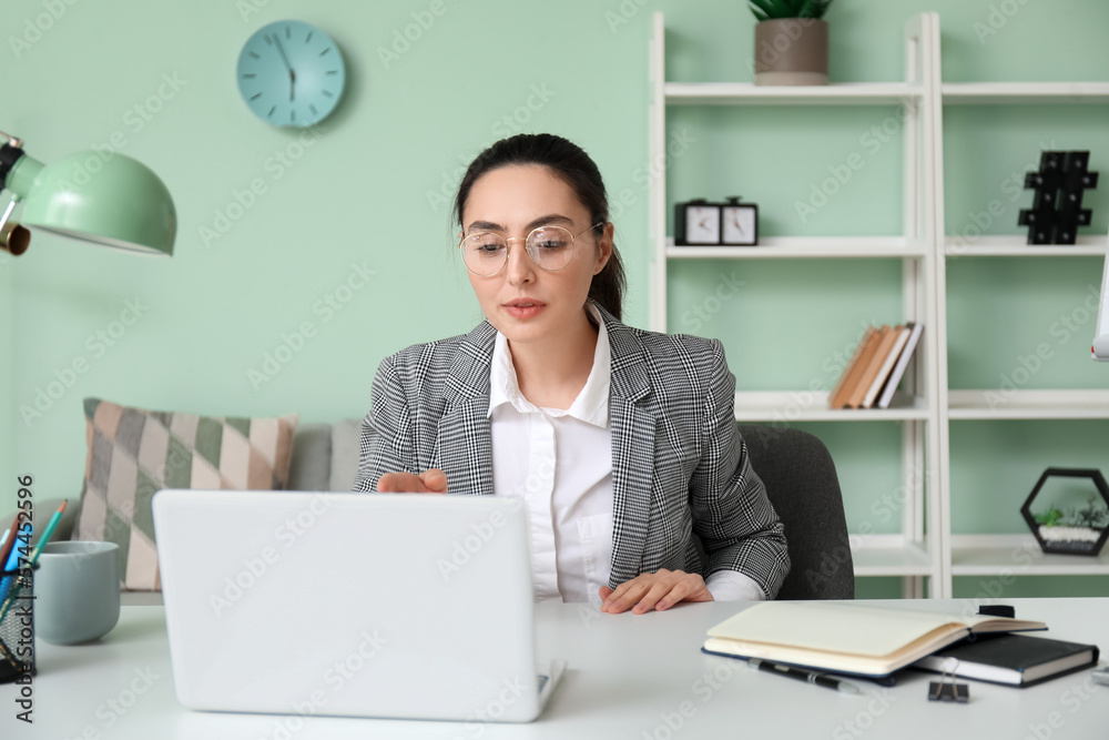 Female tutor giving online lesson at home