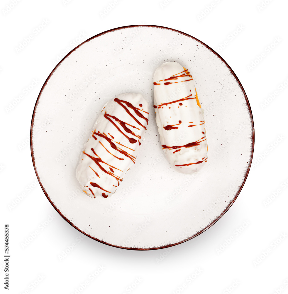 Plate with sweet eclairs isolated on white background