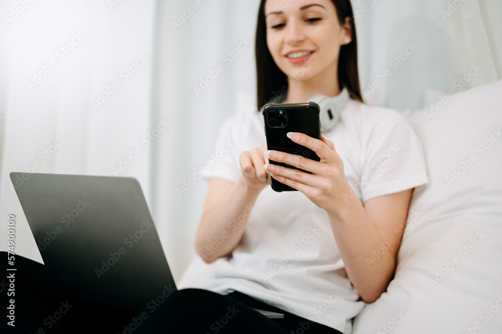 Good Healthy woman drinking tea and resting in white bed at bedroom. Lifestyle at home concept in mo