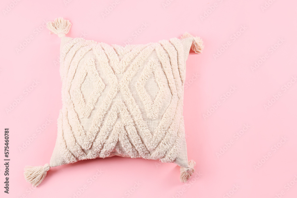 Stylish decorative pillow on pink background